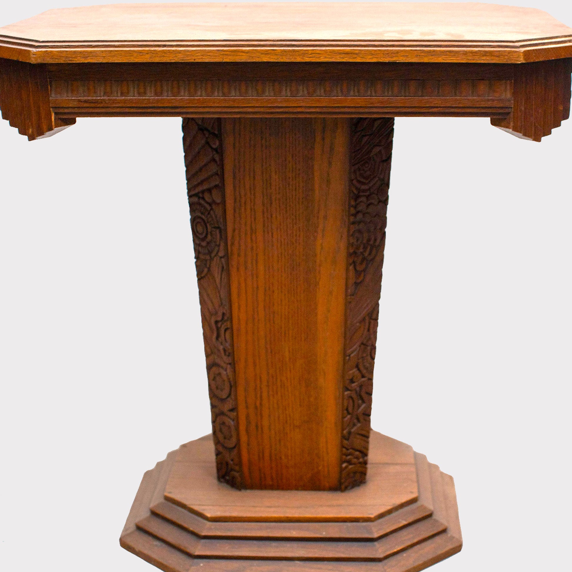 side view of German Floral Carved Oak Art Deco Side Table