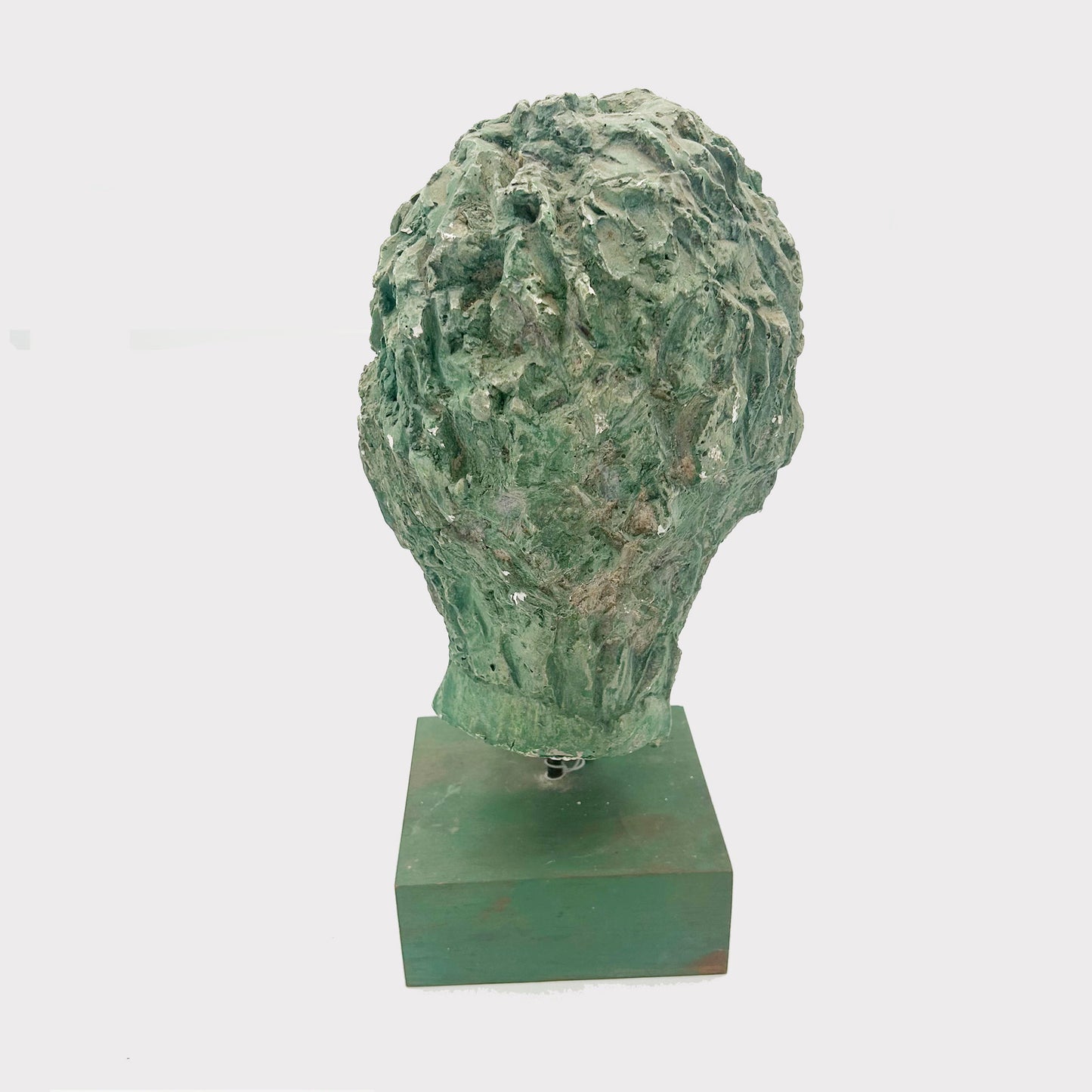 back of roman head plaster bust on a mount with virdigris finish