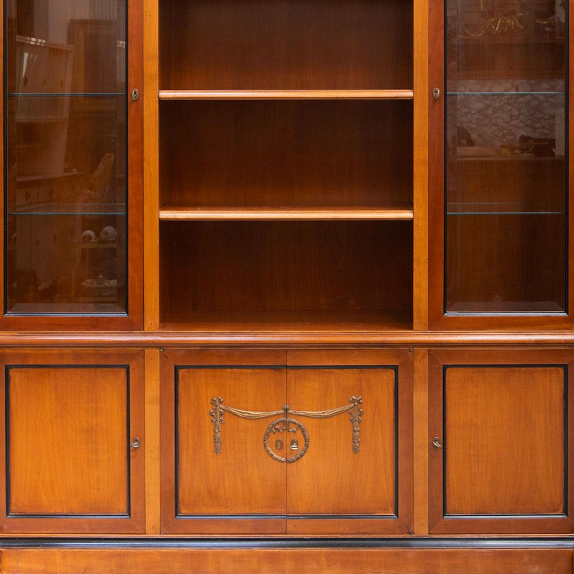 front detail of French Fruitwood Empire Breakfront Bookcase