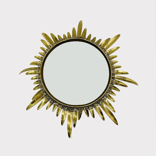 Convex Mirror framed by starburst brass pattern