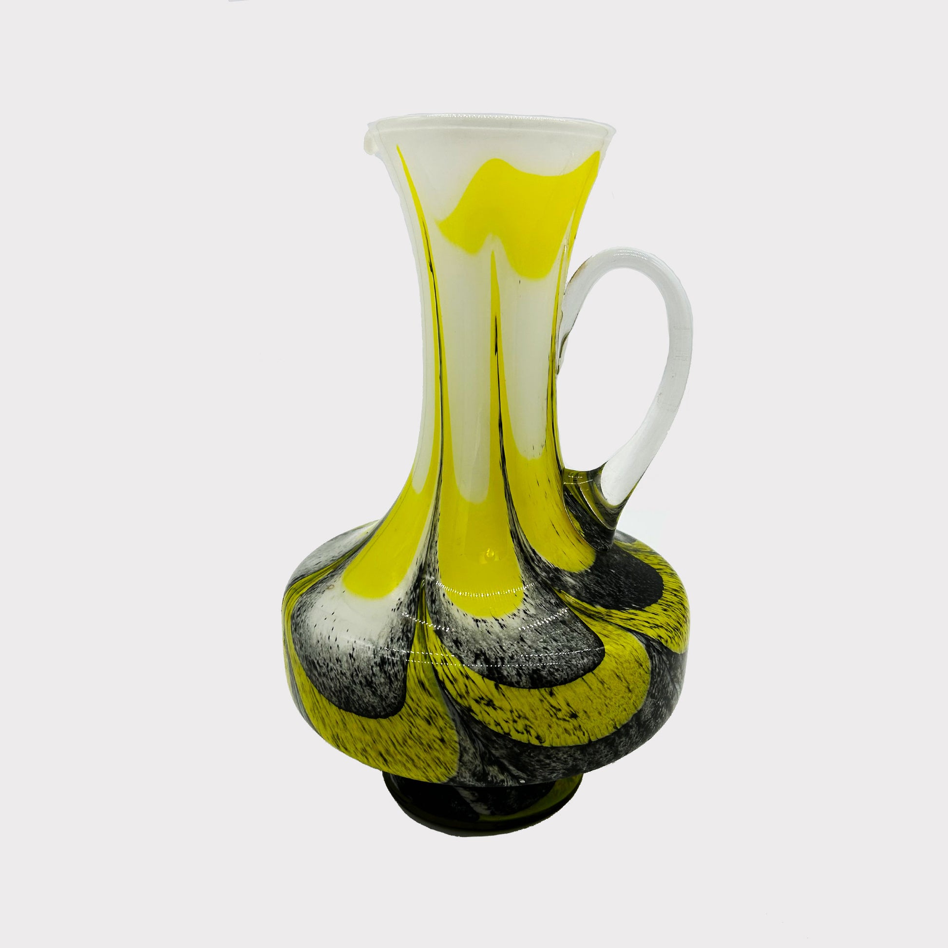 side view of Black, White and Yellow handmade Murano glass pitcher