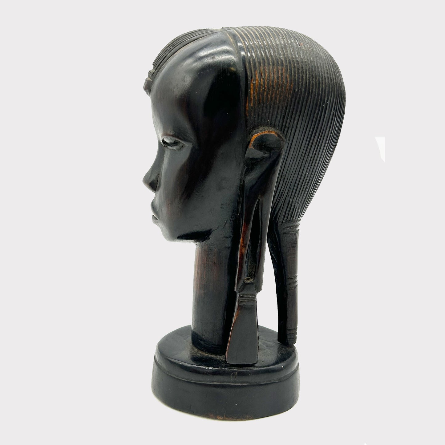 side view of a Vintage Carved African Ebony Bust